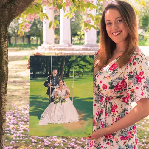 Happy bride with painting