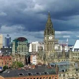 Manchester Town Hall clock tower above the city skyline