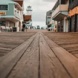A wooden boardwalk lined with shops on the New Jersey shore