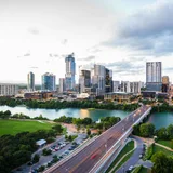 Austin's skyline and Congress Avenue Bridge over Lady Bird Lake, Texas