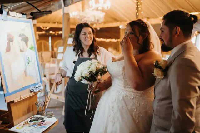Bride sharing an emotional moment with her wedding artist